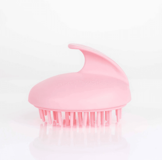 Brushworks Scalp Massaging Brush in pink, designed for gentle scalp cleansing and product build-up removal.