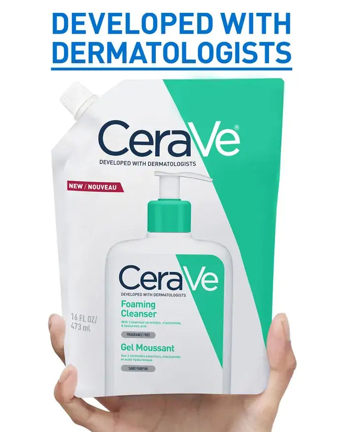 A hand holding a CeraVe Foaming Cleanser refill pouch in front of a white background, with blue text at the top reading 'DEVELOPED WITH DERMATOLOGISTS'.