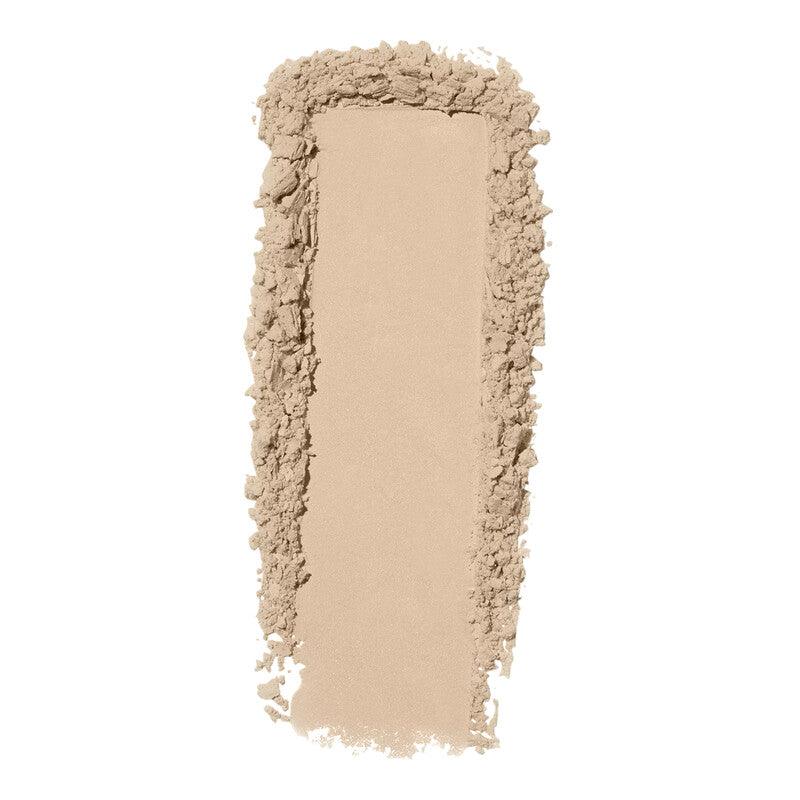 e.l.f Halo Glow Setting Powder in soft beige shade, showcasing smooth texture for an airbrushed finish.