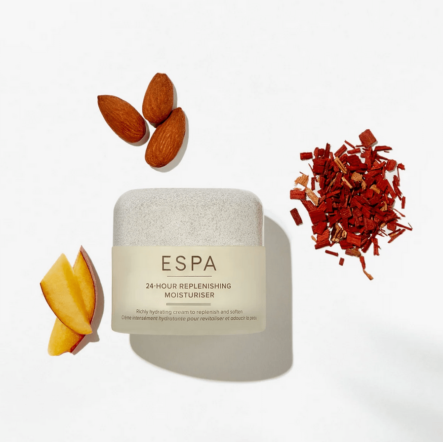 Espa 24-hour replenishing moisturizer with almonds and red flowers on a white background