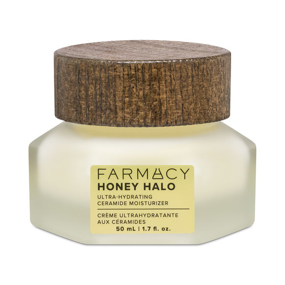 Farmacy Honey Halo moisturizer jar with wooden cap on a white background