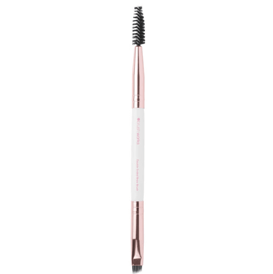 Brushworks White and Gold Brow Duo Brush for easy brow grooming and highlighting, featuring a spoolie and angled brush.