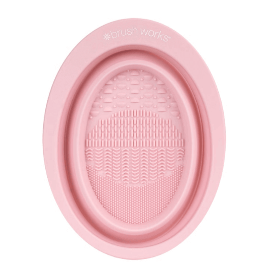 Brushworks Silicone Makeup Brush Cleaning Bowl with textured surface for deep cleaning, lightweight and foldable design.