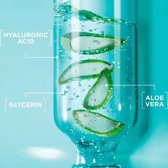 Image of a clear bottle containing water with aloe vera slices, hyaluronic acid, and glycerin for hydration.