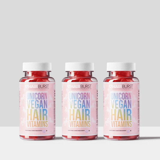 Hairburst Unicorn Vegan Hair Vitamins bottles showcasing vibrant label, designed to revitalize and strengthen hair naturally.