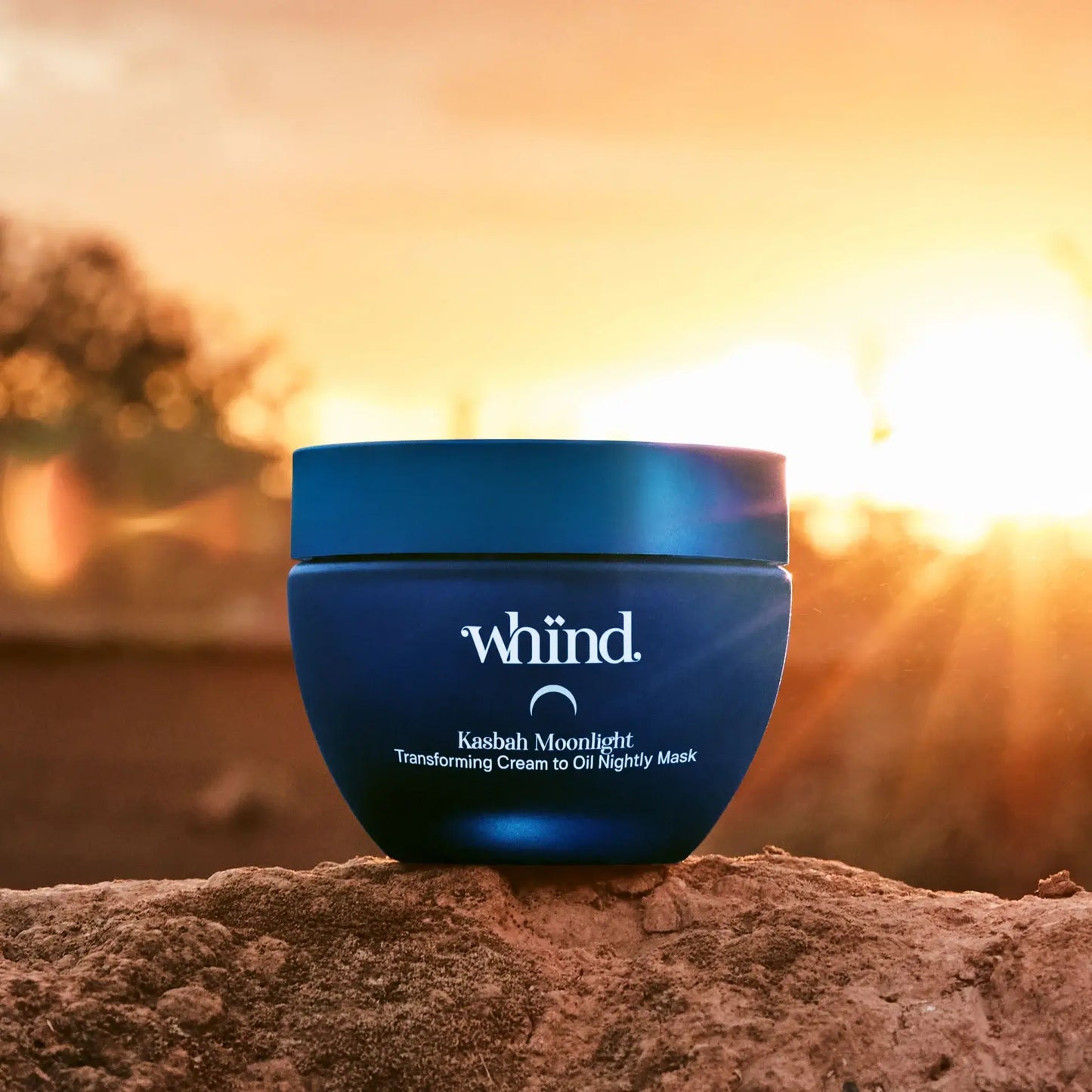 Kasbah Moonlight Overnight Recovery Cream (50ml) in a serene sunset setting, showcasing skin rejuvenation.