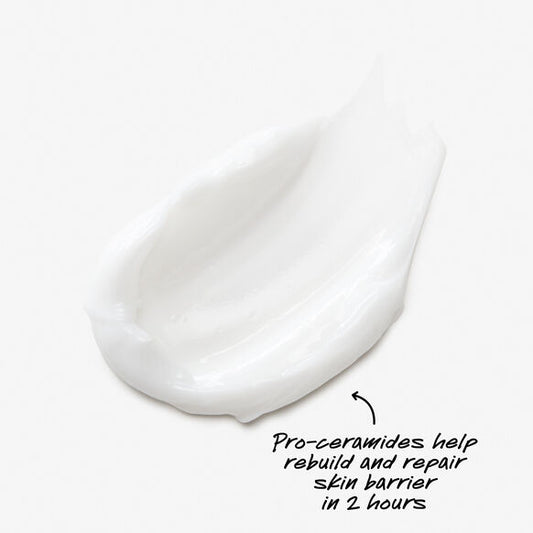 Close-up of a Kiehl's white skincare product with text on a white background