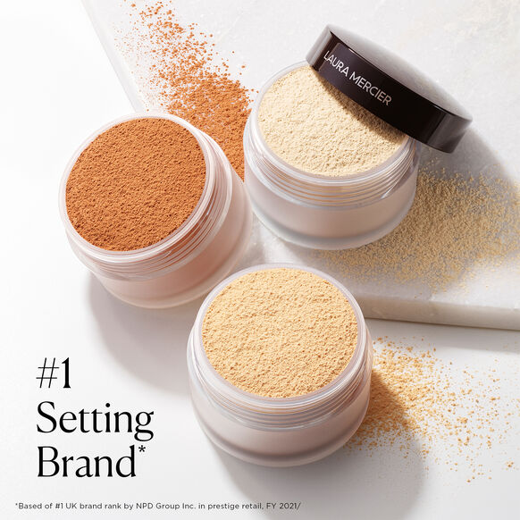 Three jars of Laura Mercier powder with open lids on a white background, featuring the brand name and '#1 Setting Brand' text.