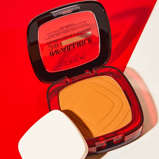 L'Oreal Compact powder with a red case on a white background
