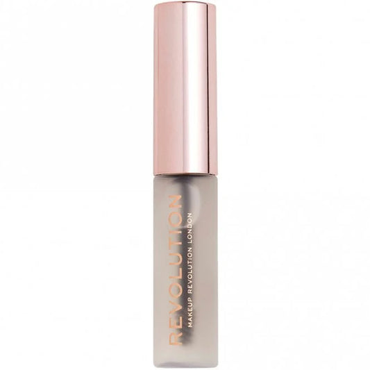 Makeup Revolution lip product with rose gold cap on white background