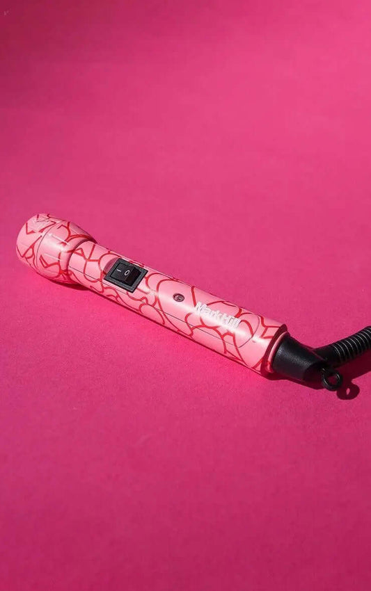 Mark Hill Love Is In The Hair Pick N Mix Wand Handle in pink design on a vibrant pink background.