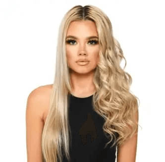 Portrait of a woman with long, wavy blonde hair styled with curls created by a curling wand.