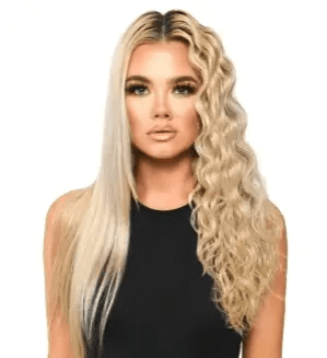 Model showcasing hair with waves on one side and straight on the other, demonstrating styling results with Mark Hill Mermaid Waver.