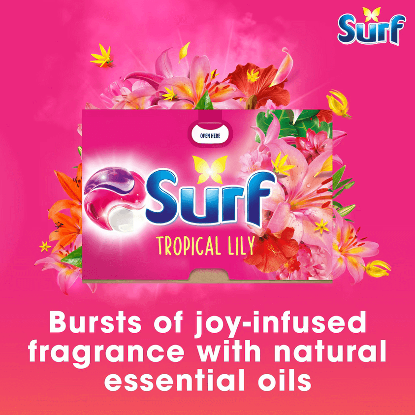 Surf Tropical Lily laundry capsules packaging with floral design and slogan about joy-infused fragrance.
