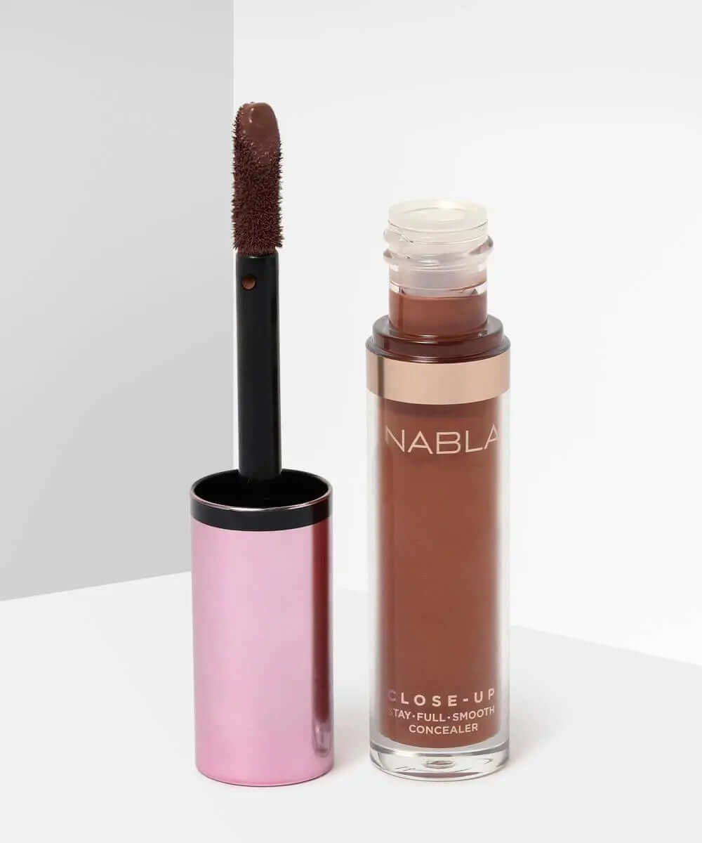 NABLA Close Up Concealer in brown shade, featuring a doe-foot applicator for easy application and blending.