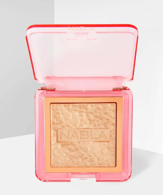 NABLA Skin Glazing baked highlighter in pink compact with shimmering powder for a radiant complexion.