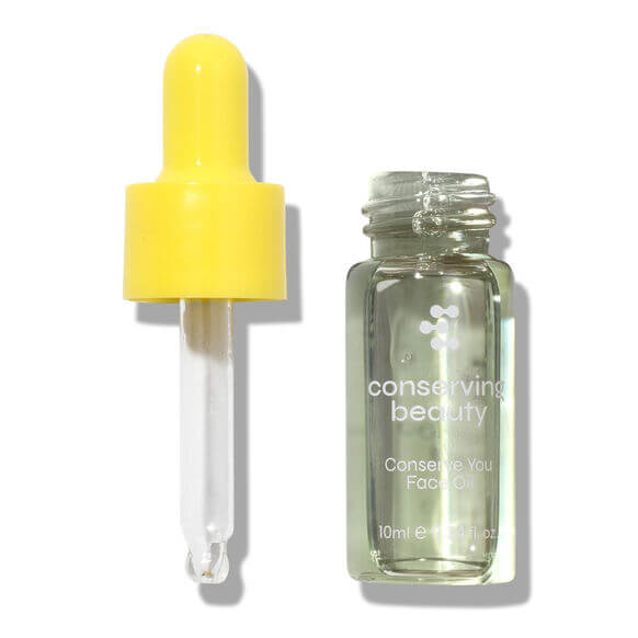 Conserving Beauty Conserve You Face Oil in a glass bottle with a dropper, offering plant-based skincare for radiant skin.