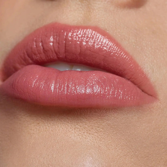 Close-up of lips featuring Nudestix Gel Colour Lip and Cheek Balm in shade J Mama with a glossy finish.