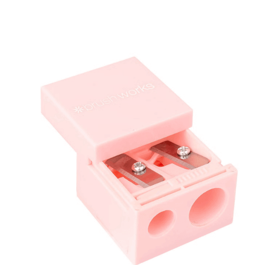 Brushworks Pencil Sharpener in pink, designed for all pencil sizes with a convenient case for mess-free sharpening.