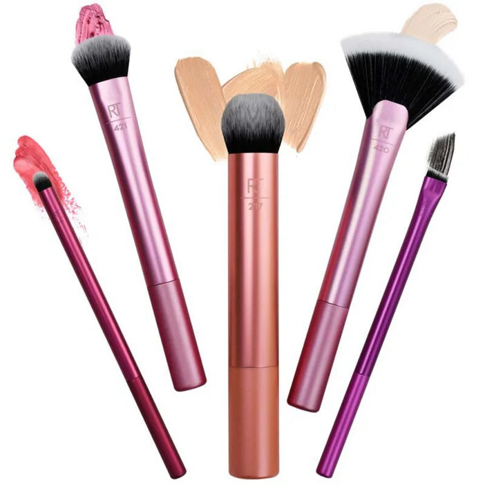 Real Techniques Artists Essentials set featuring five makeup brushes for flawless application.