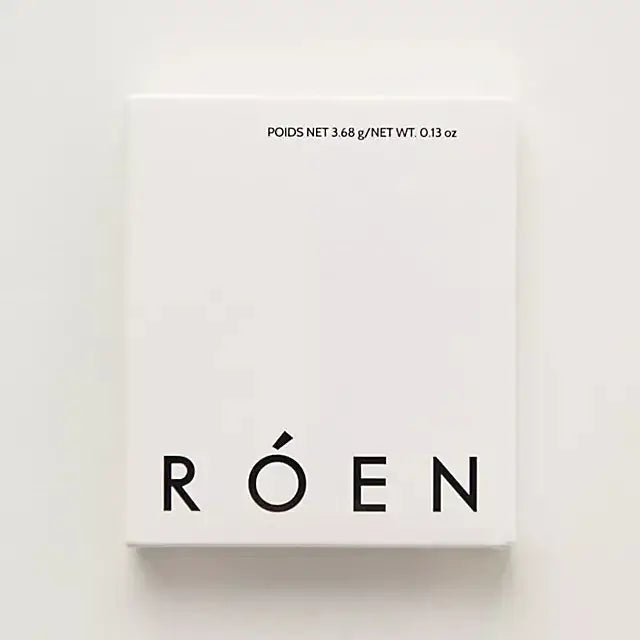 RÓEN Eyes On Me Eyeshadow Palette packaging, sleek white design with bold black lettering.
