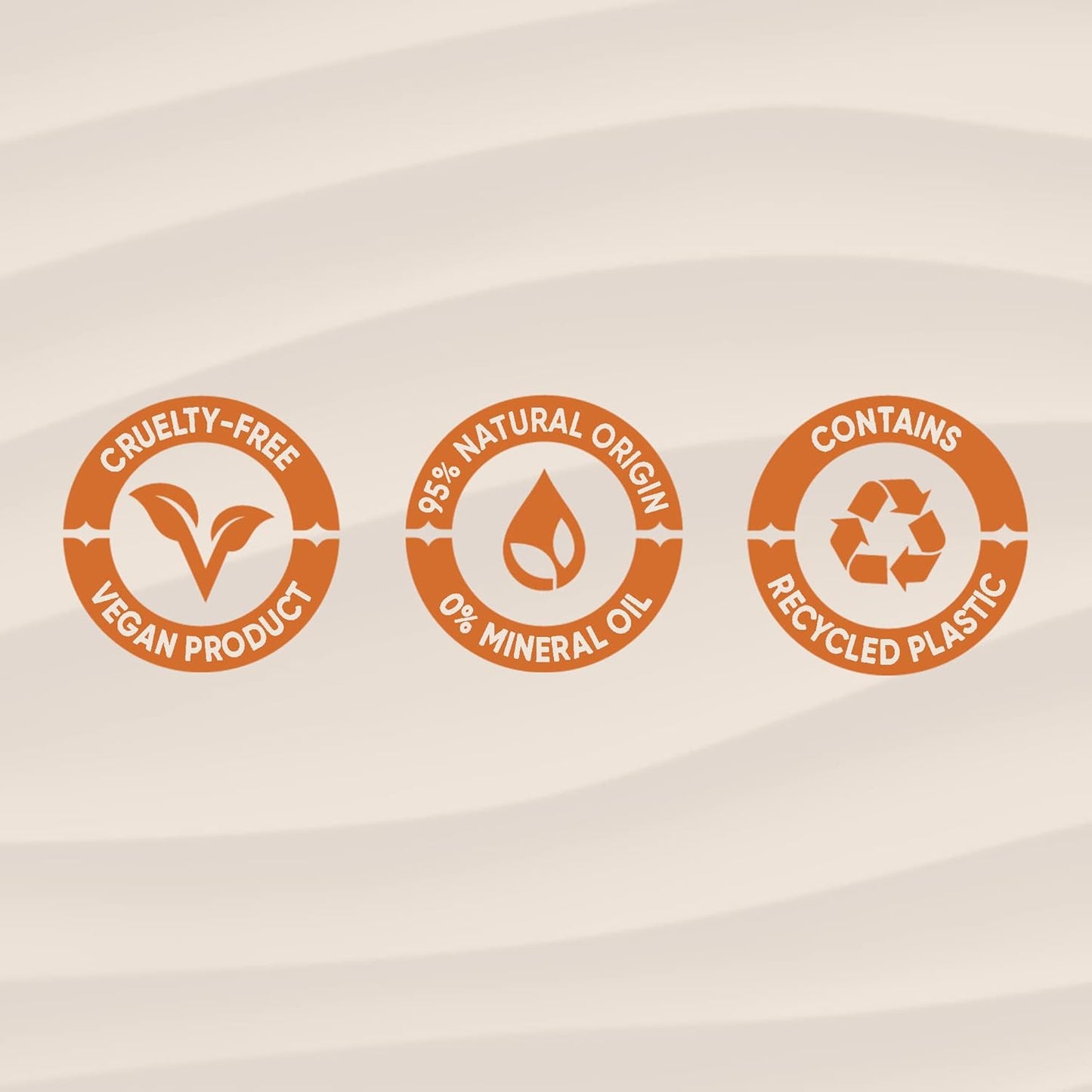 Sanctuary Spa Three circular icons on a beige background indicating cruelty-free, natural origin, and recycled plastic content.