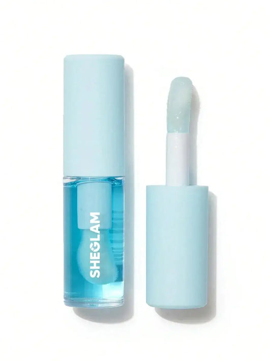SHEGLAM Jelly Wow hydrating lip oil in blue tube with applicator, providing moisturizing shine and antioxidant benefits.