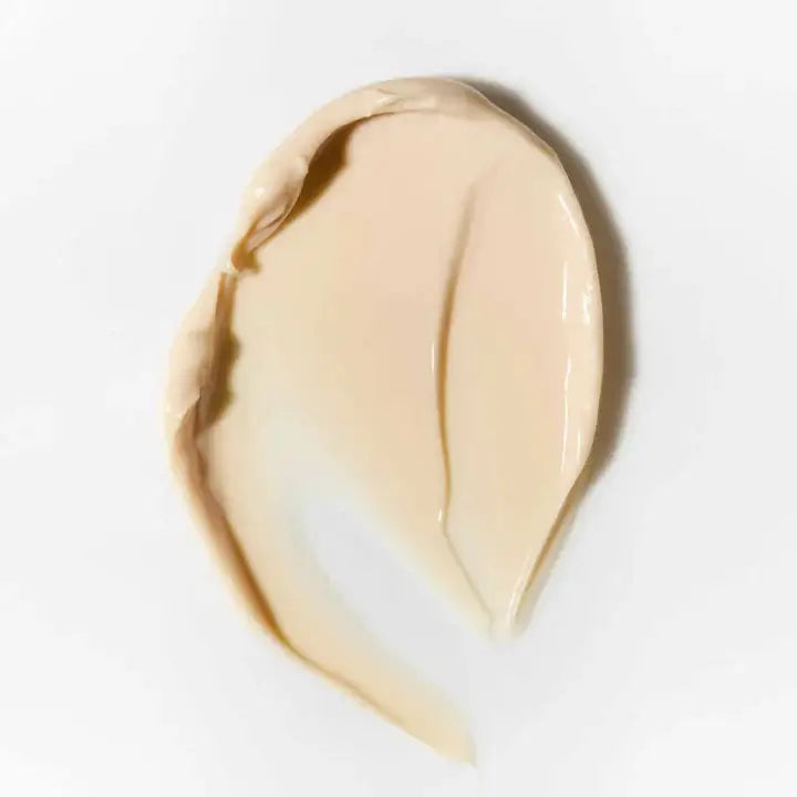 Pale cream texture of SUSANNE KAUFMANN Glow Mask, showcasing its smooth and moisturizing consistency for radiant skin.