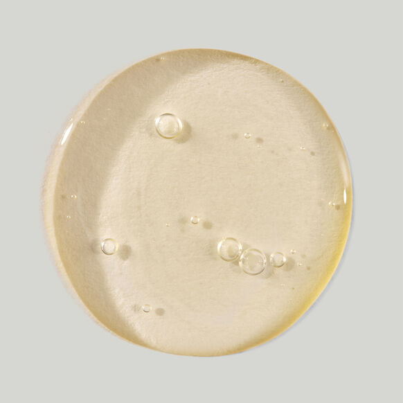 Beige gel with bubbles on a light gray background