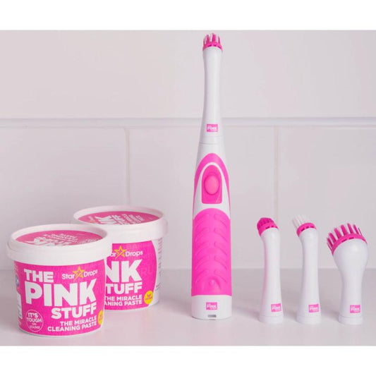 The Pink Stuff Miracle Scrubber Brush Set with cleaning paste and 4 interchangeable brush heads for efficient cleaning.