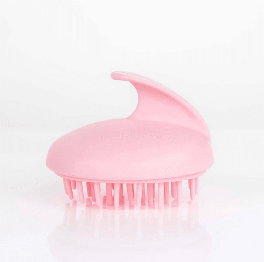 Brushworks Scalp Massaging Brush in pink, designed for gentle scalp cleansing and product build-up removal.