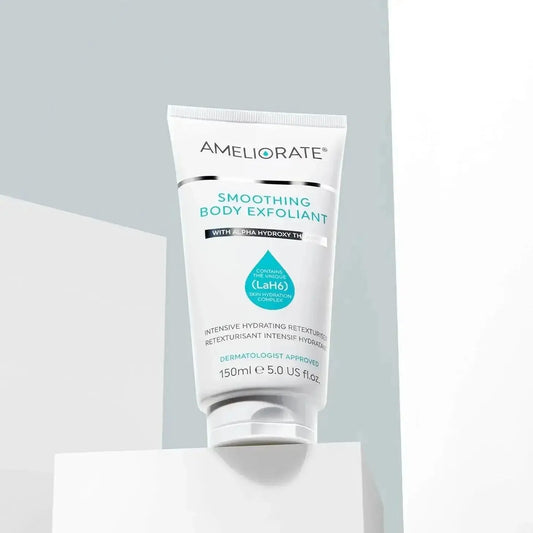 AMELIORATE Smoothing Body Exfoliant 150ml tube showcasing its alpha-hydroxy therapy formula for smooth skin.