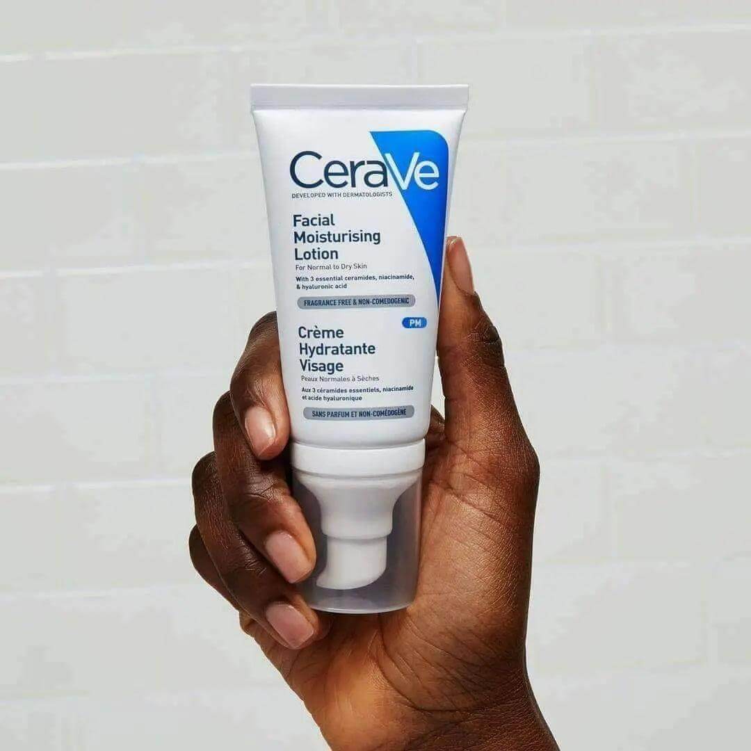 CeraVe Facial Moisturising Lotion 50ml held in hand, designed for daily hydration and skin barrier protection.
