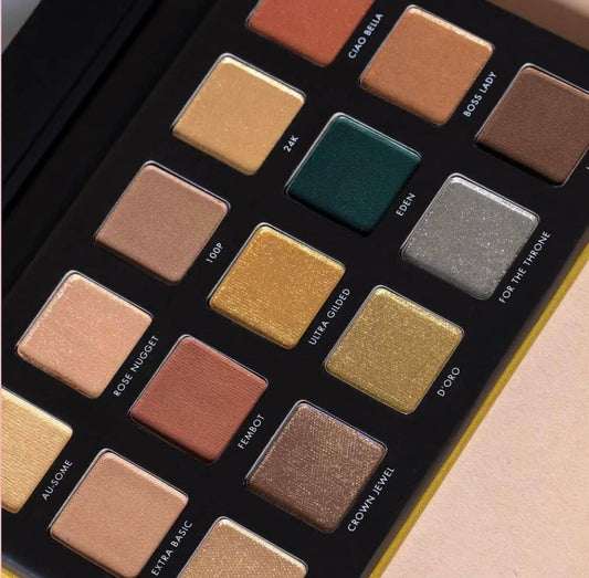 Milani Gilded Gold Palette with 15 hyper-pigmented shades including buttery mattes and metallics in gold and jade.