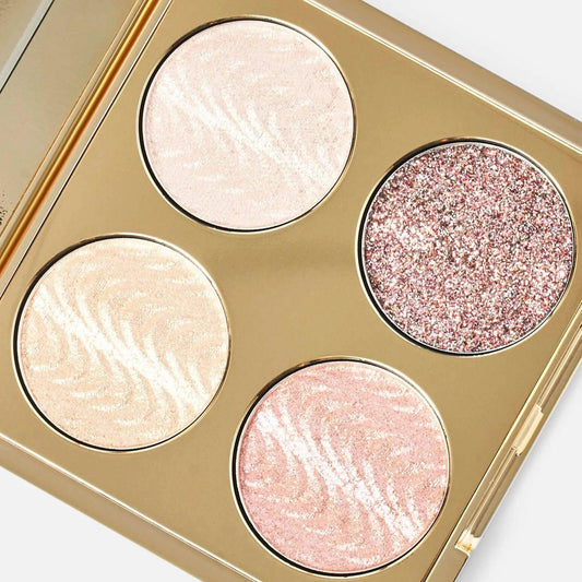 Revolution Pro Champagne Crystal Quad Palette featuring four jewel-toned eyeshadows in matte, shimmer, and glitter finishes.