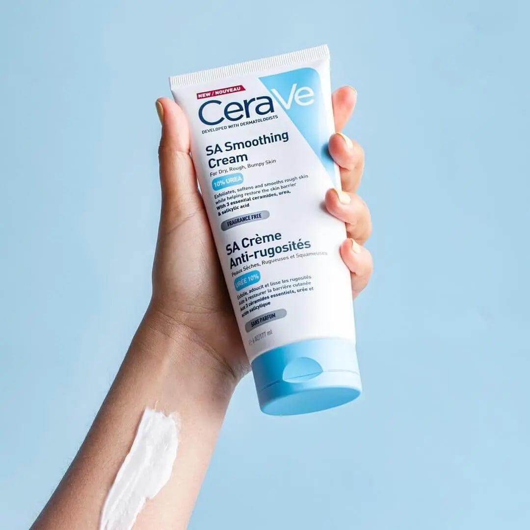 CeraVe Smoothing Cream 177ml in hand, promoting hydration and smooth skin with Salicylic Acid and ceramides.
