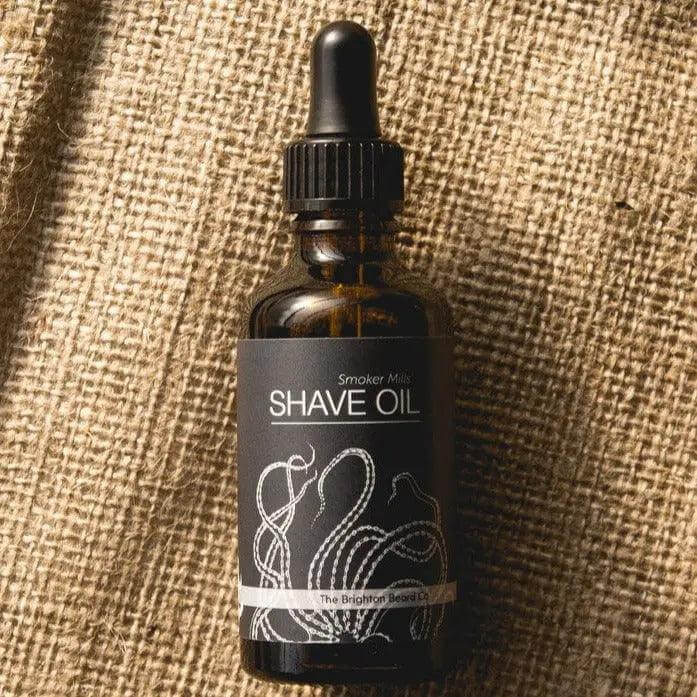Brighton Beard Co Smoker Mills Shave Oil 30ml in an amber glass bottle with dropper, perfect for pre and post shaving care.