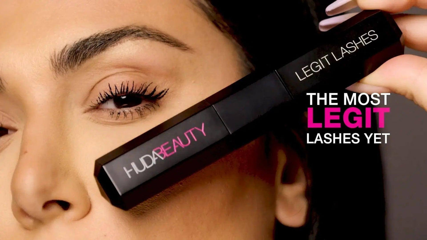 Close-up of HUDA Beauty Legit Lashes Double-Ended Mascara showcasing dramatic lashes and sleek packaging.