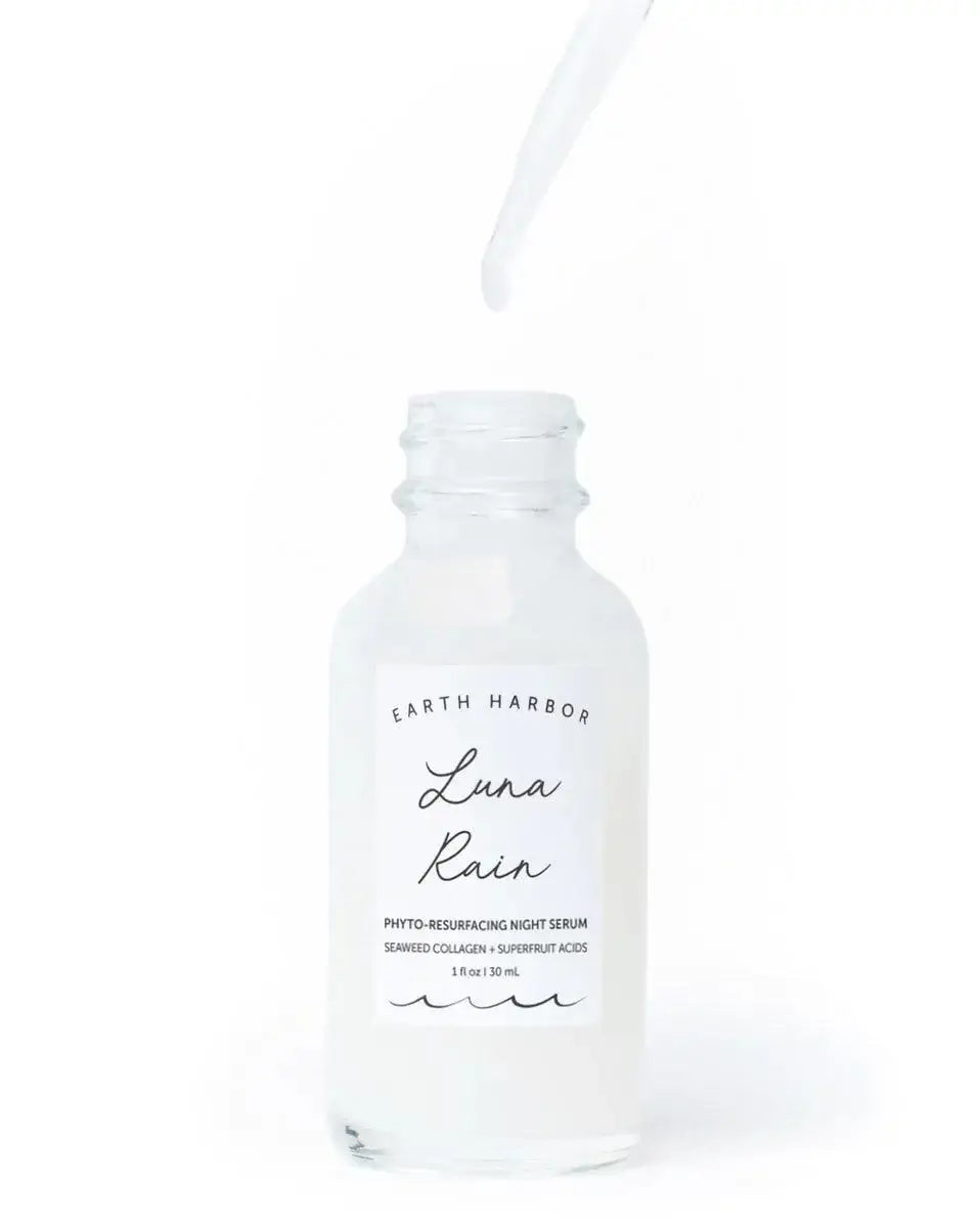 Earth Harbour Luna Rain Phyto-Resurfacing Night Serum bottle with dropper for glowing skin and dark spot treatment.