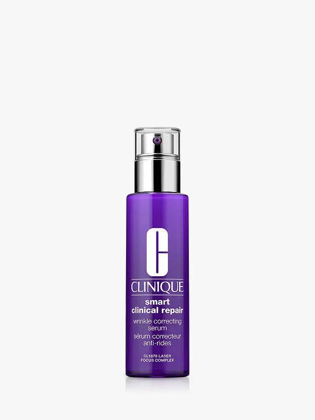 CLINIQUE Smart Clinical Repair Wrinkle Correcting Serum in purple bottle designed to target wrinkles and rejuvenate skin.