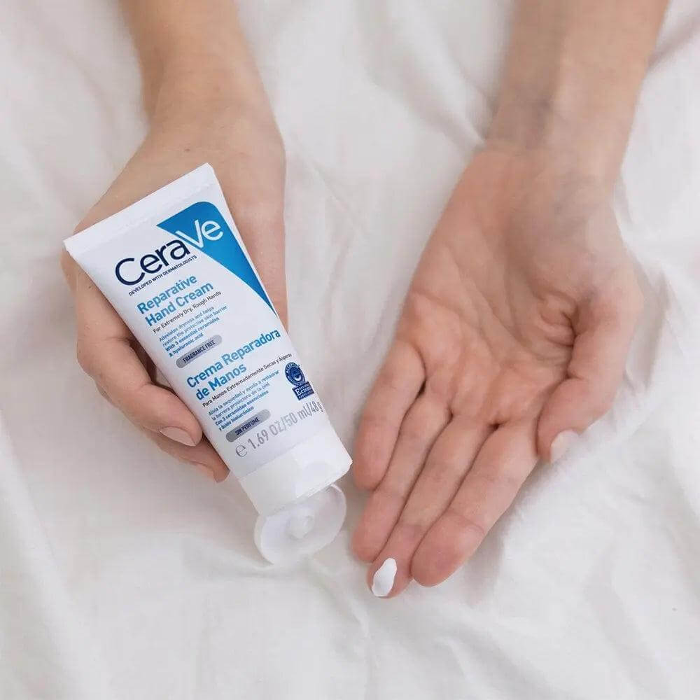 CeraVe Soothing & Repairing Hand Cream 50ml in a hand, showcasing moisturizing benefits for dry skin.