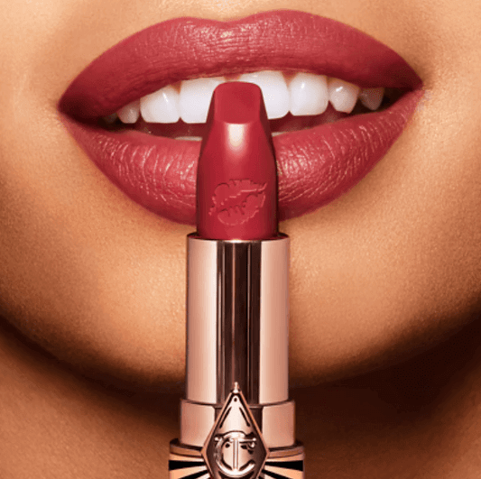 Charlotte Tilbury Hot Lips 2 Viva Le Vergara lipstick, soft-wine shade, enhancing glamour and confidence.