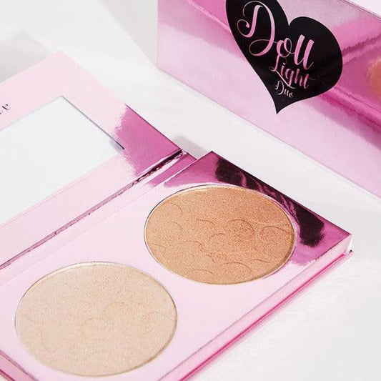 Doll Beauty Light Highlighter Duo palette with two shimmering shades in pink compact.