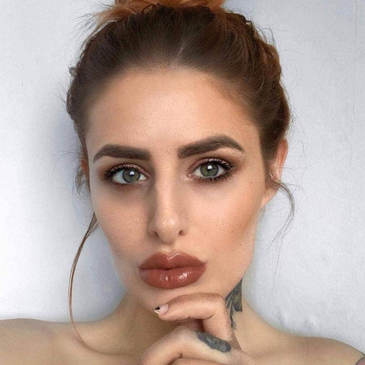 Model showcasing Dr.PawPaw Rich Mocha Balm on lips, highlighting a natural, hydrated look with a subtle glow.