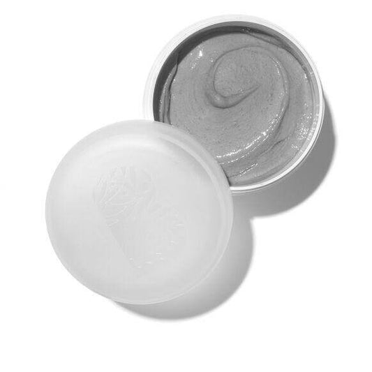 Briogeo Scalp Revival Charcoal + Coconut Oil Micro-Exfoliating Scalp Scrub in open container, showcasing grey scrub texture.