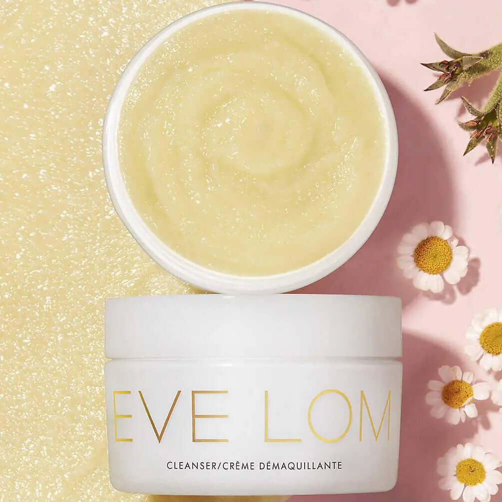 EVE LOM Cleanser 100ml in a jar, promoting radiant and glowing skin with a blend of aromatic plant oils.