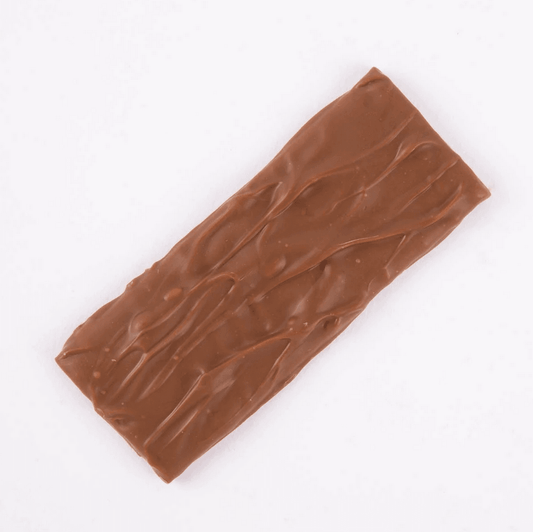 Daim chocolate bar featuring smooth milk chocolate exterior and signature wavy texture, perfect for snacking.