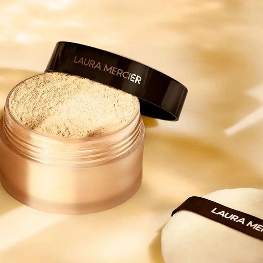 Laura Mercier Translucent Loose Setting Powder in Honey, lightweight with natural finish for a flawless look.