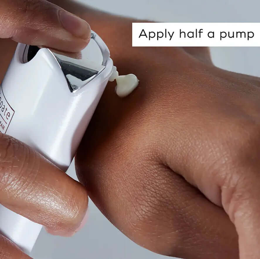 Applying Medik8 R-Retinoate Day & Night Eye Serum on skin, showcasing half a pump dosage.