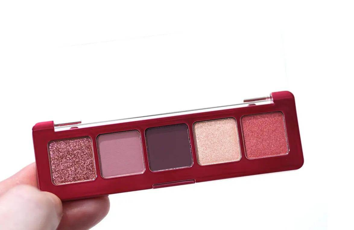Natasha Denona Mini Love Eyeshadow Palette featuring five pink-toned shades with lilac undertones.